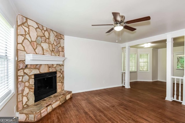 2636 Suzanne Ln, Acworth, GA 30102 - unfurnished living room with crown molding, ceiling fan, a fireplace, baseboards, and wood finished floors