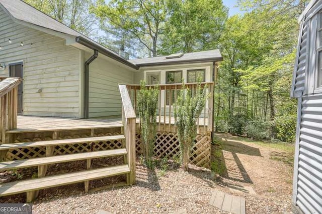 exterior space featuring a wooden deck