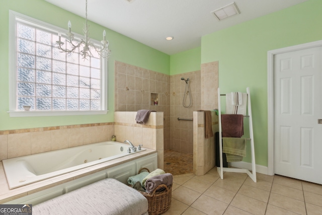 bathroom with walk in shower, visible vents, plenty of natural light, and a whirlpool tub