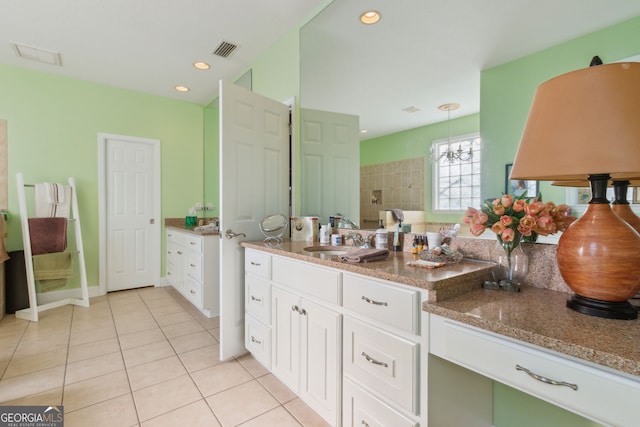 bathroom with recessed lighting, visible vents, tile patterned flooring, and vanity