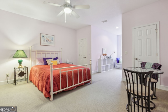 bedroom featuring baseboards, carpet flooring, and visible vents
