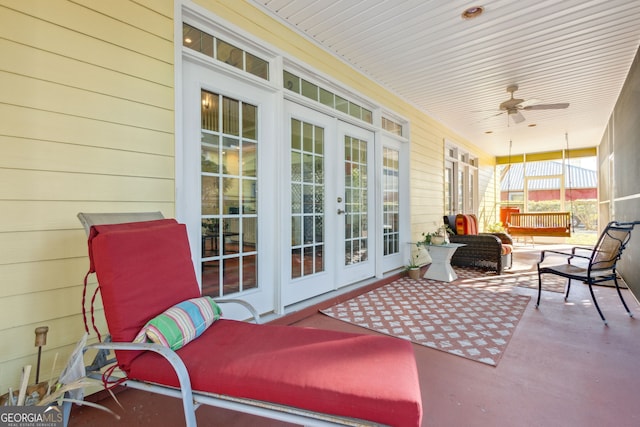 view of patio featuring a porch, ceiling fan, and french doors