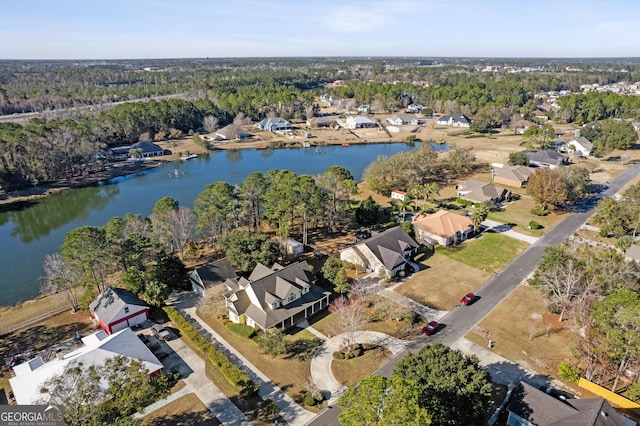 aerial view with a water view and a residential view