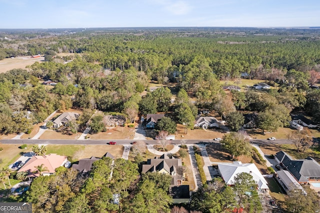 aerial view with a residential view and a forest view