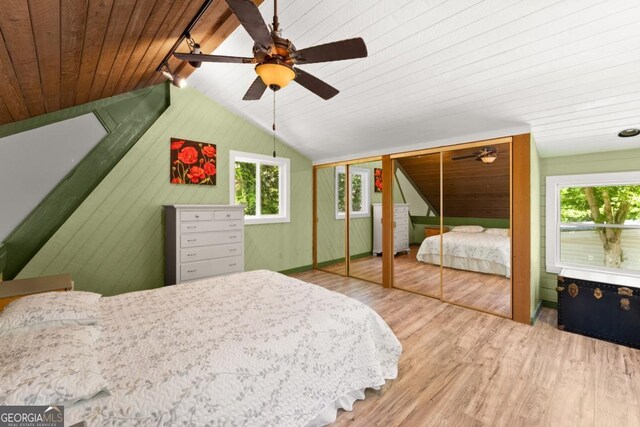115 Rabbit Run, Dawsonville, GA 30534 - bedroom with two closets, multiple windows, wood ceiling, and lofted ceiling