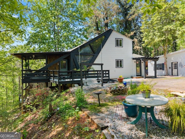 115 Rabbit Run, Dawsonville, GA 30534 - rear view of property with a deck