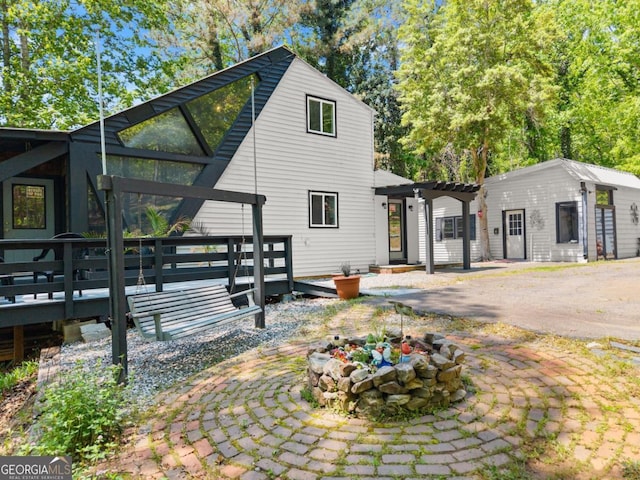115 Rabbit Run, Dawsonville, GA 30534 - view of front of house featuring a pergola and a deck