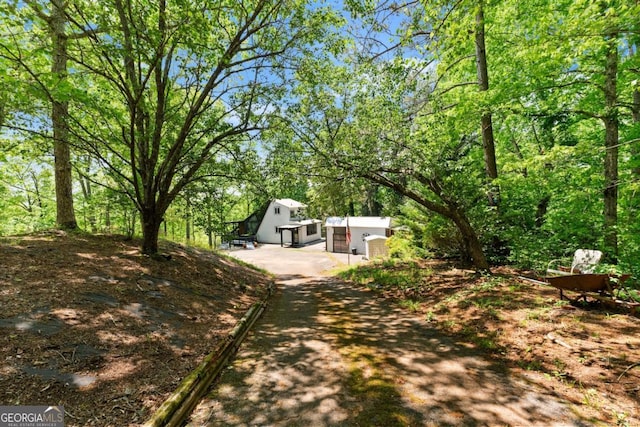 115 Rabbit Run, Dawsonville, GA 30534 - view of yard with an outbuilding