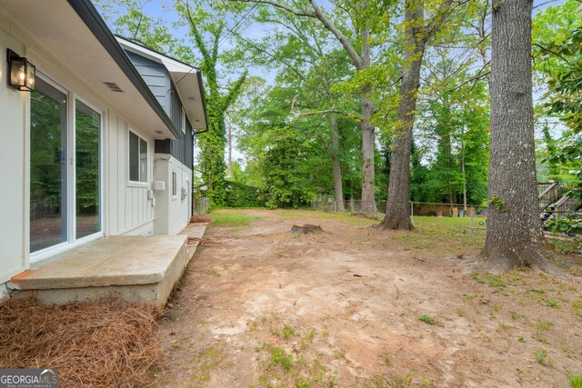 view of yard with fence