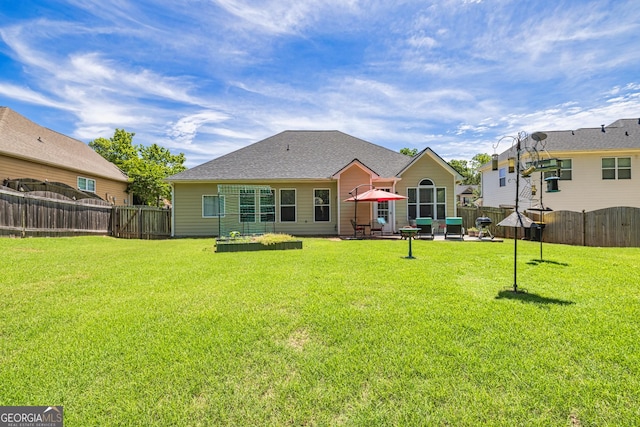 rear view of property with a patio area