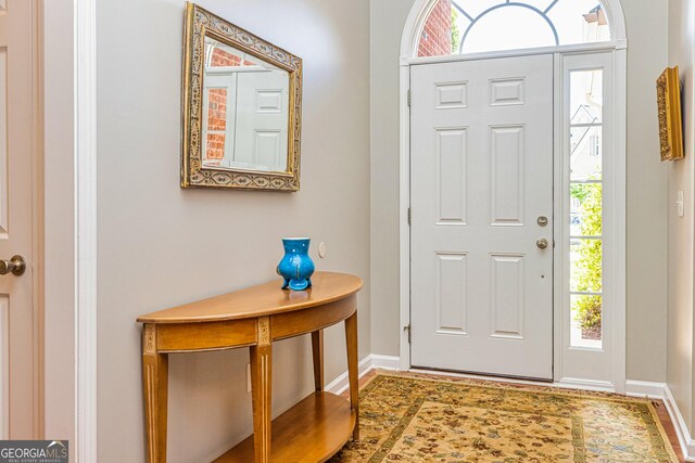 entrance foyer featuring baseboards