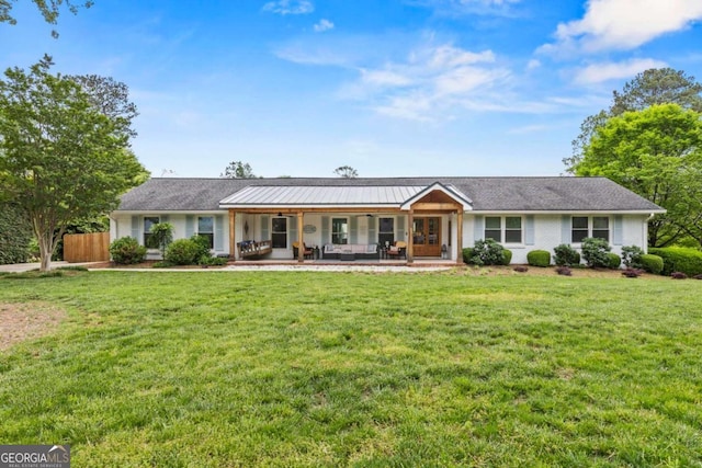 single story home with fence and a front yard
