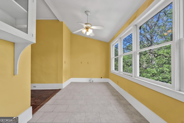 209 W Robert Toombs Ave, Washington, GA 30673 - empty room featuring a ceiling fan, baseboards, tile patterned flooring, and lofted ceiling