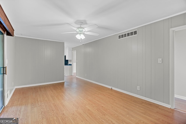 115 Linda Way, Fayetteville, GA 30215 - unfurnished room featuring ceiling fan, visible vents, crown molding, baseboards, and light wood-style floors