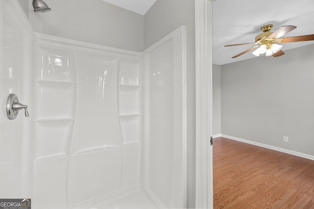 115 Linda Way, Fayetteville, GA 30215 - full bath with a ceiling fan, baseboards, wood finished floors, and a shower