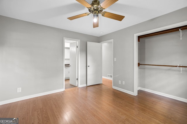 115 Linda Way, Fayetteville, GA 30215 - unfurnished bedroom with visible vents, baseboards, wood finished floors, and a closet