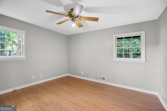 115 Linda Way, Fayetteville, GA 30215 - spare room with baseboards, ceiling fan, light wood finished floors, and visible vents