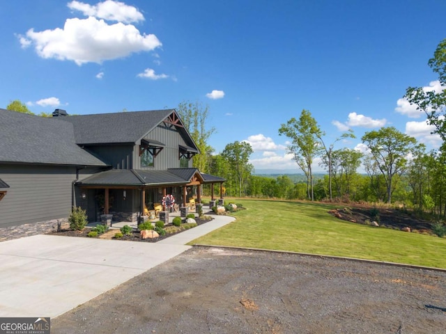 281 Abbott Dr, Canton, GA 30114 - view of green lawn with a porch