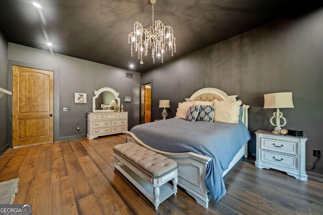 281 Abbott Dr, Canton, GA 30114 - bedroom with wood finished floors, a chandelier, and baseboards