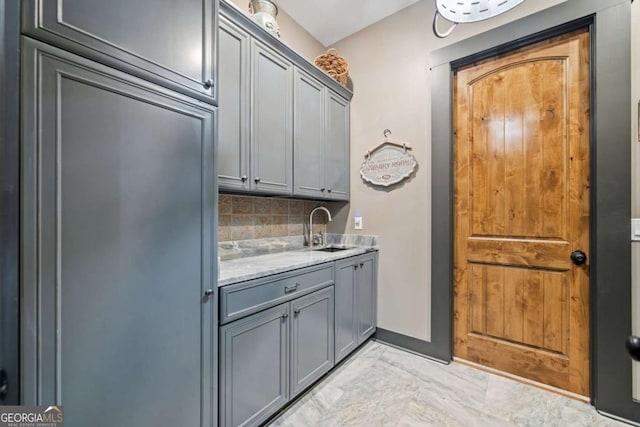 281 Abbott Dr, Canton, GA 30114 - laundry area featuring a sink and light marble finish flooring
