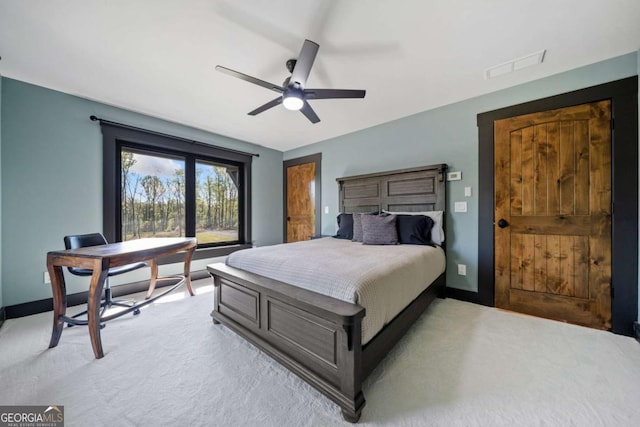281 Abbott Dr, Canton, GA 30114 - bedroom with baseboards, ceiling fan, and light colored carpet