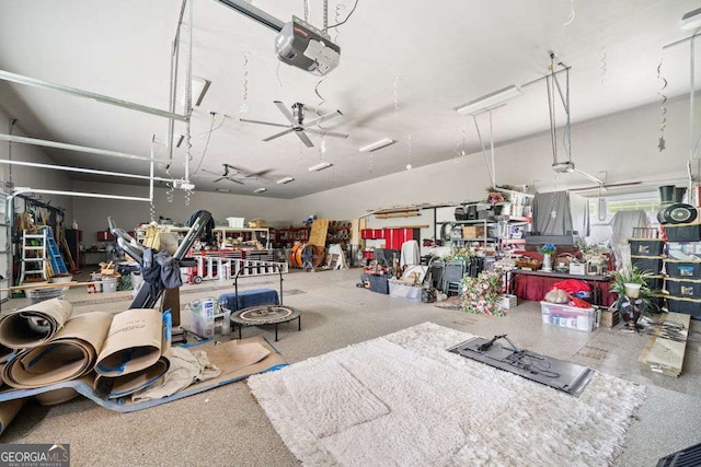 281 Abbott Dr, Canton, GA 30114 - garage with a garage door opener and ceiling fan