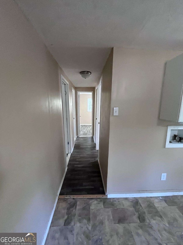 corridor with baseboards