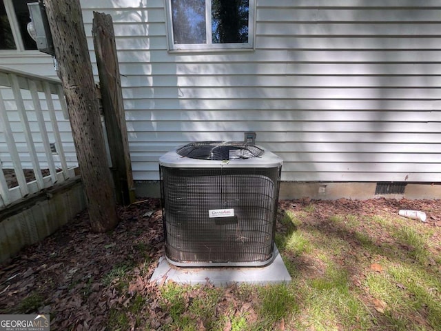 exterior details with central air condition unit and crawl space