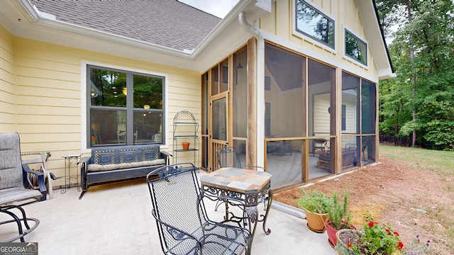 view of patio / terrace with a sunroom