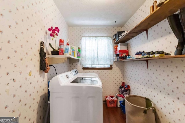 5152 Clearwater Dr, Stone Mountain, GA 30087 - clothes washing area featuring laundry area, wallpapered walls, washer and clothes dryer, and wood finished floors