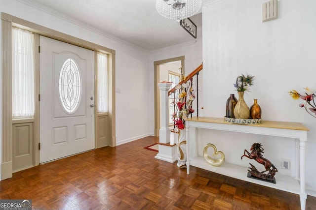 5152 Clearwater Dr, Stone Mountain, GA 30087 - entryway with an inviting chandelier, baseboards, visible vents, ornamental molding, and stairway