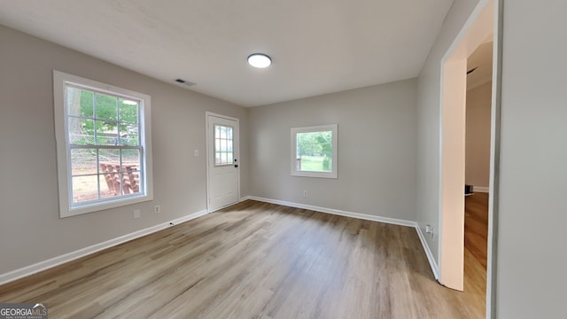 931 Justin Dr, Winder, GA 30680 - foyer featuring visible vents, baseboards, and wood finished floors
