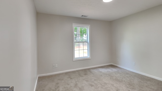 931 Justin Dr, Winder, GA 30680 - empty room with visible vents, carpet, and baseboards