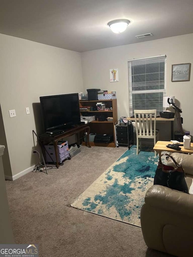 713 Dove Tree Ln, Social Circle, GA 30025 - carpeted living room featuring baseboards and visible vents
