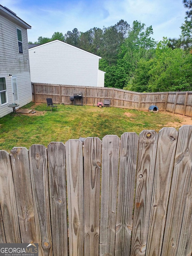 713 Dove Tree Ln, Social Circle, GA 30025 - view of yard with a fenced backyard
