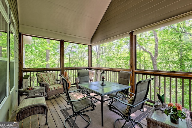 sunroom / solarium featuring an outdoor living space