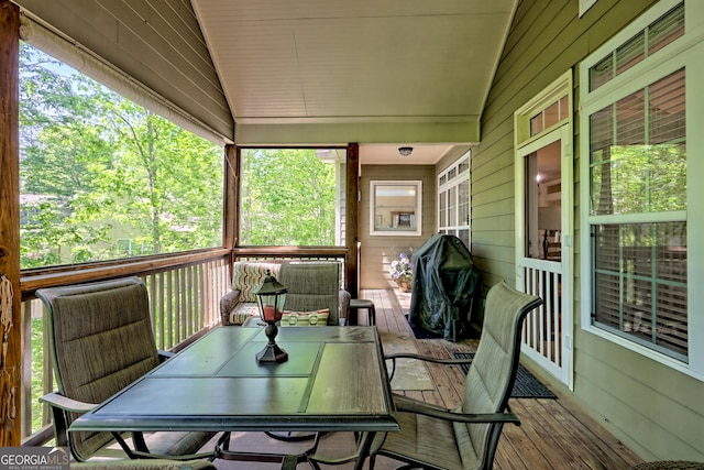 deck featuring outdoor dining area