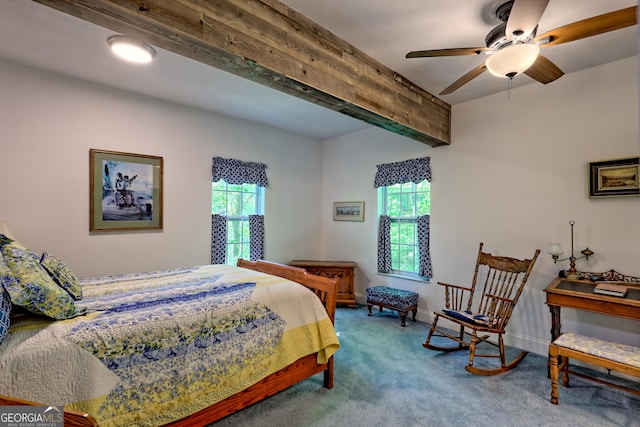 carpeted bedroom with baseboards and multiple windows