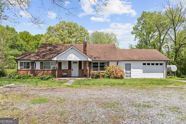 7255 Blue Ridge Dr, Blue Ridge, GA 30513 - ranch-style house featuring an attached garage, brick siding, a porch, a chimney, and driveway