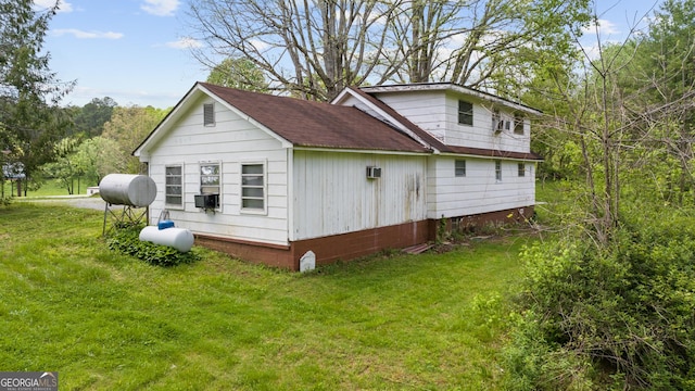 7255 Blue Ridge Dr, Blue Ridge, GA 30513 - view of home's exterior featuring a yard, heating fuel, and roof with shingles