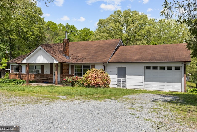 7255 Blue Ridge Dr, Blue Ridge, GA 30513 - ranch-style home featuring covered porch, driveway, a chimney, an attached garage, and a shingled roof
