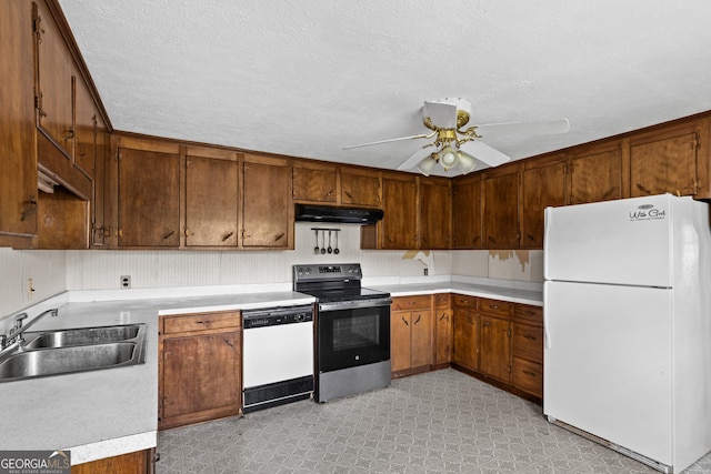 7255 Blue Ridge Dr, Blue Ridge, GA 30513 - kitchen featuring a ceiling fan, a sink, light countertops, under cabinet range hood, and white appliances