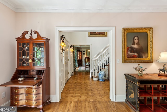 4584 E Conway Dr, Atlanta, GA 30327 - corridor with crown molding, baseboards, stairs, and parquet floors