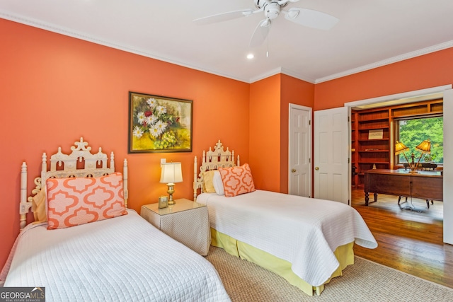 4584 E Conway Dr, Atlanta, GA 30327 - bedroom featuring crown molding, ceiling fan, and wood finished floors