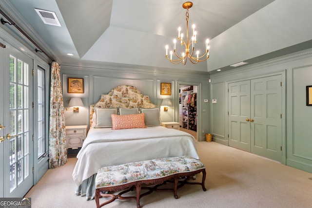 4584 E Conway Dr, Atlanta, GA 30327 - bedroom featuring carpet floors, visible vents, an inviting chandelier, and a closet