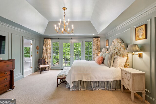 4584 E Conway Dr, Atlanta, GA 30327 - bedroom with an inviting chandelier, carpet, lofted ceiling, and access to outside