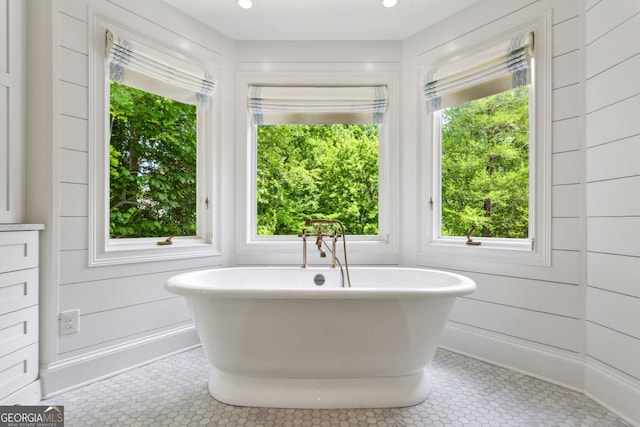 4584 E Conway Dr, Atlanta, GA 30327 - full bath featuring a freestanding bath, tile patterned floors, and plenty of natural light