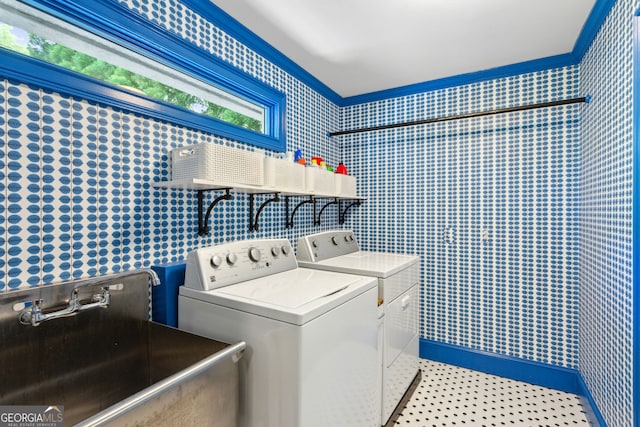 4584 E Conway Dr, Atlanta, GA 30327 - laundry area featuring laundry area, a sink, separate washer and dryer, and wallpapered walls