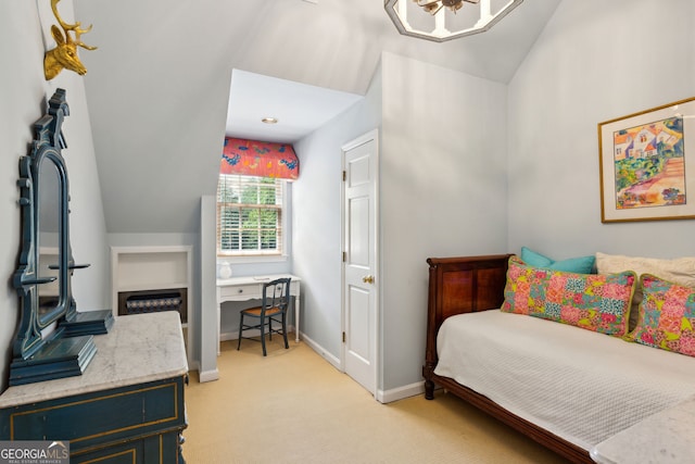 4584 E Conway Dr, Atlanta, GA 30327 - bedroom with baseboards, vaulted ceiling, and light colored carpet
