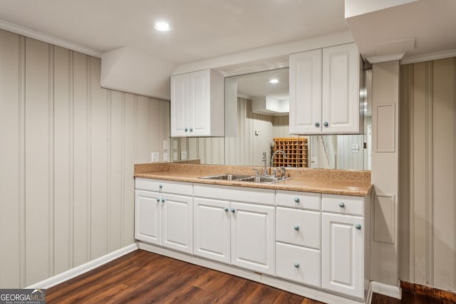 4584 E Conway Dr, Atlanta, GA 30327 - kitchen with a sink, white cabinetry, dark wood-style floors, and light countertops
